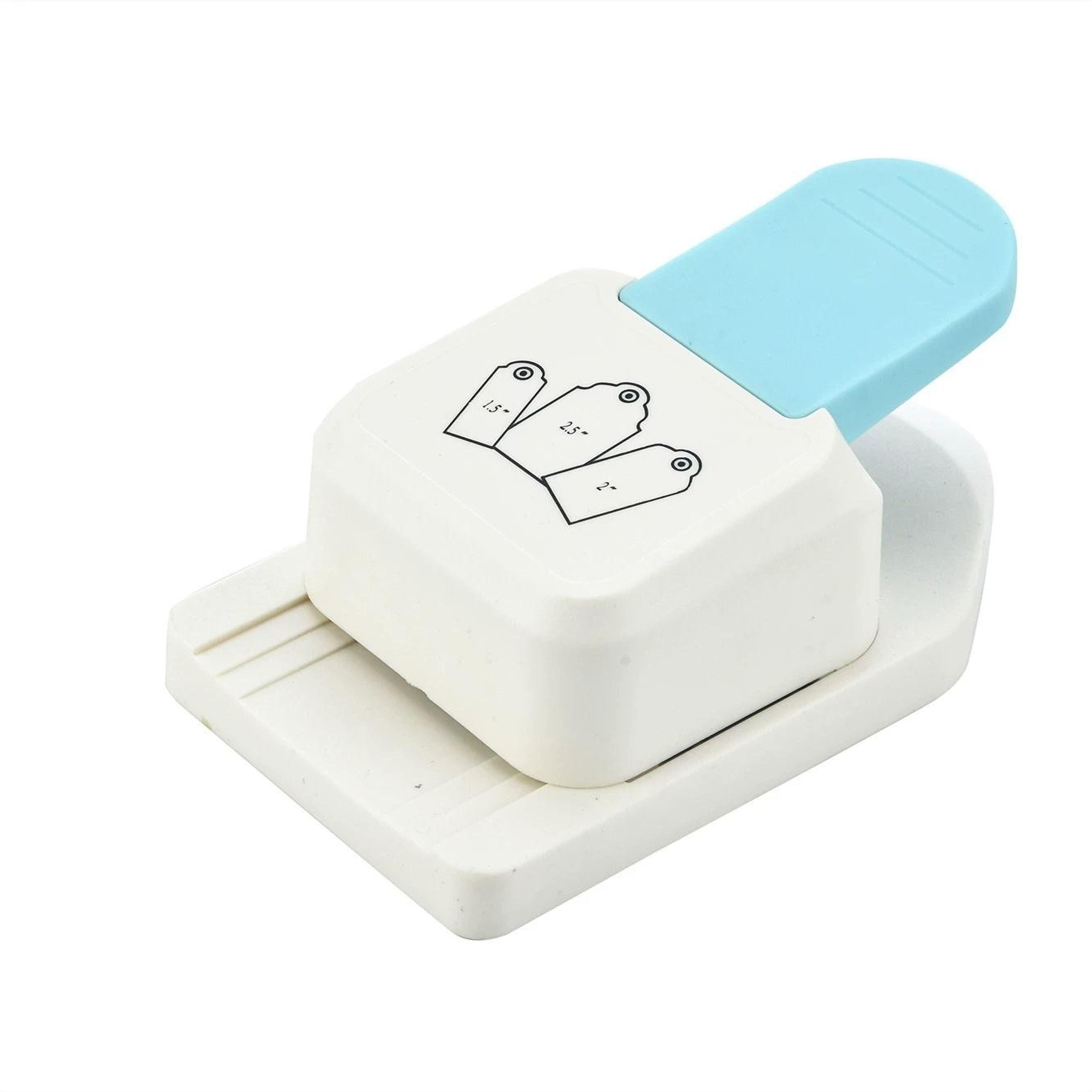 A white and blue plastic punch with a blue handle and a black and white design on the front.