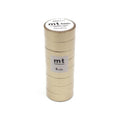 A stack of gold-colored metallic tape rolls with a label that reads "mt basic" and "marking tape".