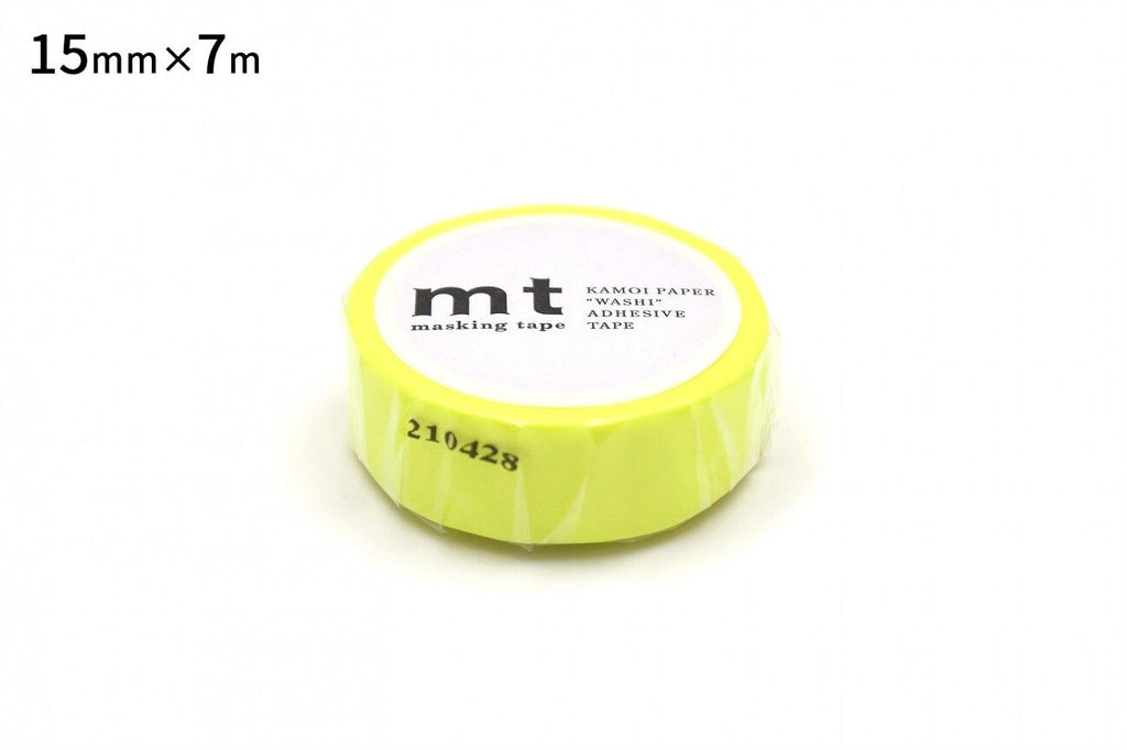 A yellow and white masking tape roll with the text "mt" printed on it.