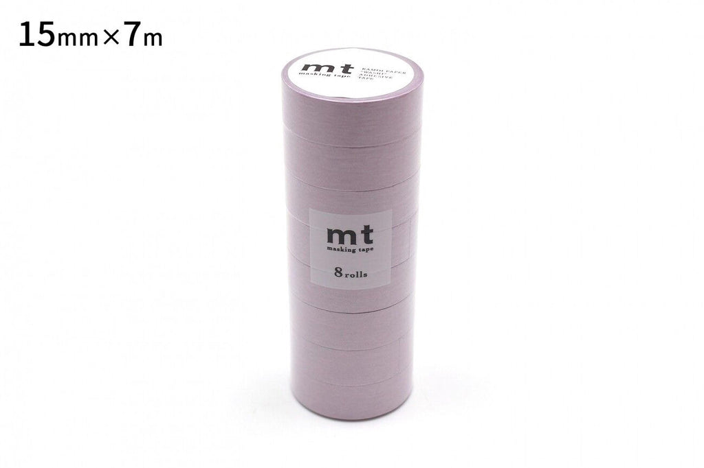 A stack of pink masking tape rolls with the label "mt masking tape" and the size "15mm x 7m".