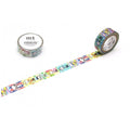a roll of colorful, patterned tape with various cartoon characters on it, lying on a white surface.