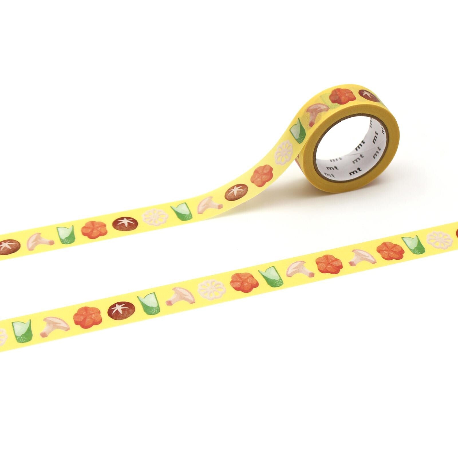 a roll of yellow tape with a repeating pattern of various food items, such as mushrooms, tomatoes, and other vegetables, on it.
