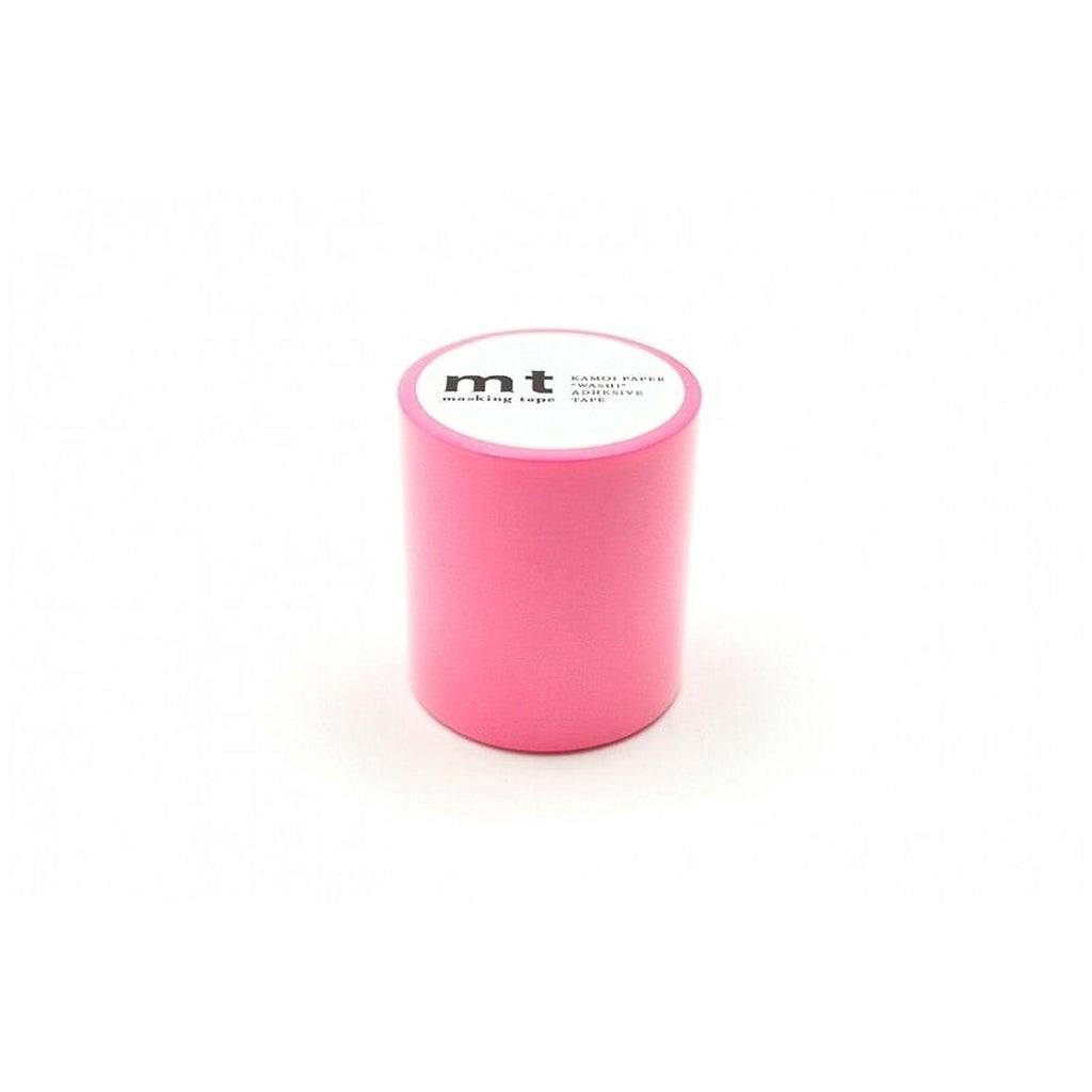 A bright pink cylindrical object with a white label on it, placed against a white background.