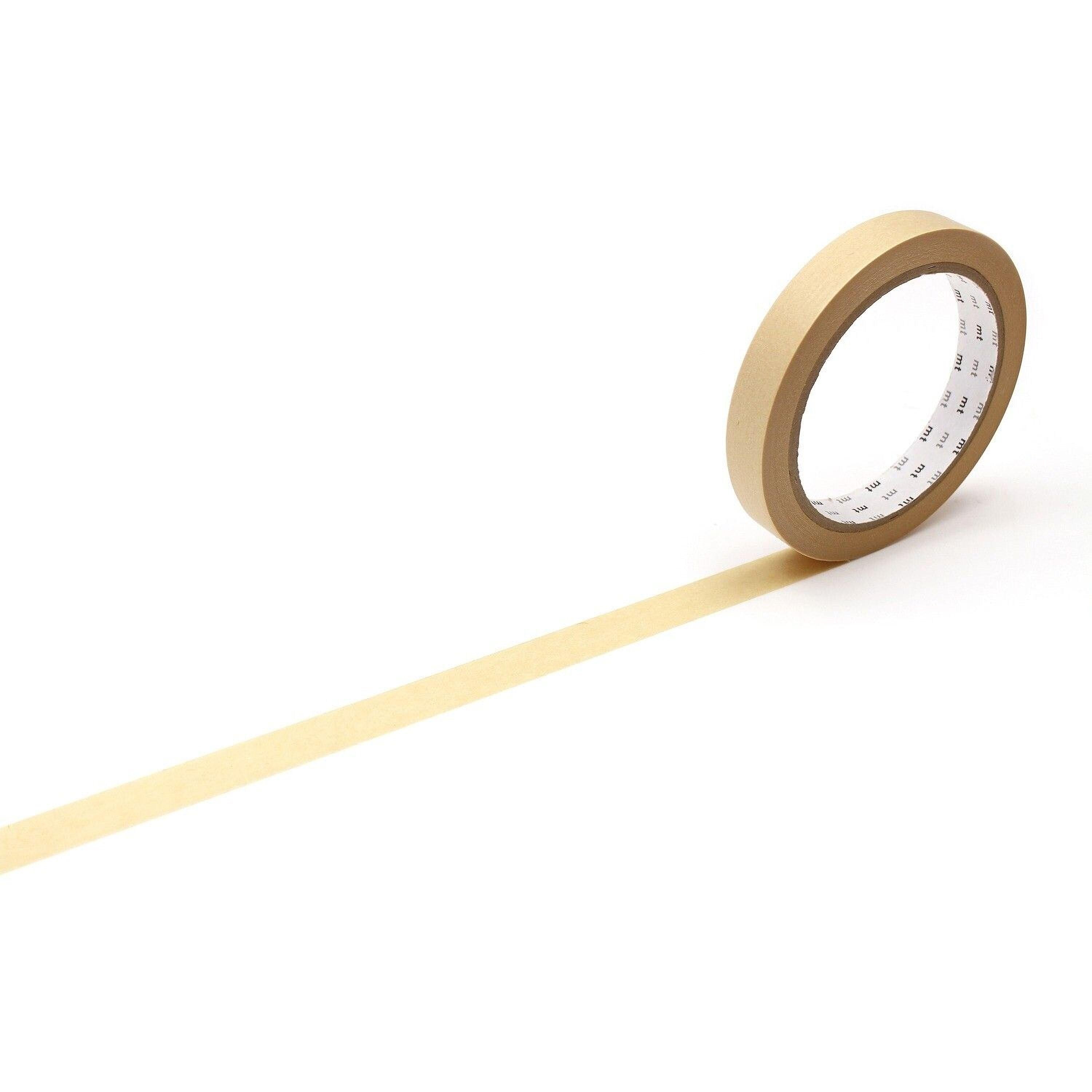 A roll of yellow tape is lying on its side on a white background.