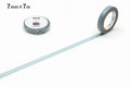 a roll of gray and white patterned tape on a white background, with a smaller roll of the same tape placed next to it.