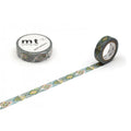 a roll of masking tape with a patterned design and a single roll of tape placed next to it.
