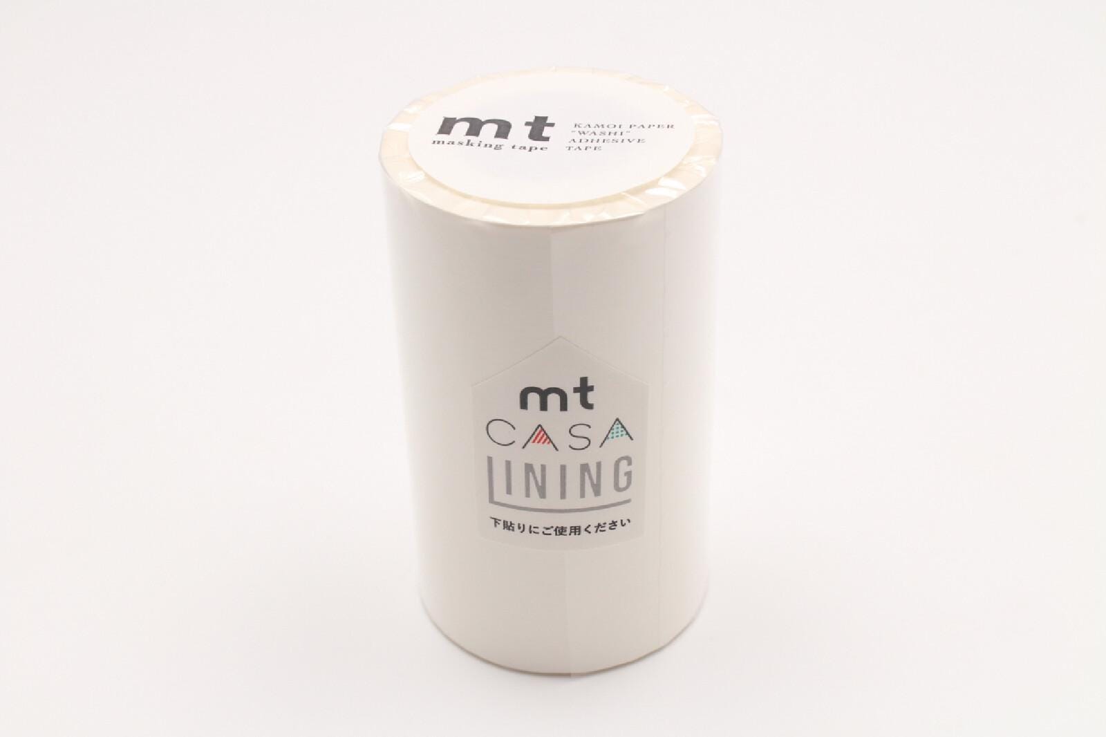 A cylindrical object with a label that reads "mt CASA INNING" and "Masking tape".
