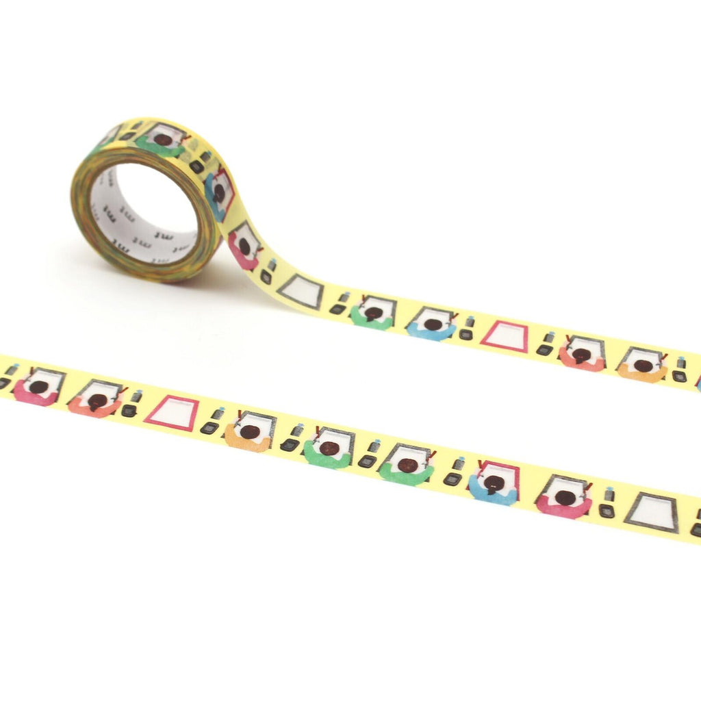 a roll of yellow tape with a repeating pattern of colorful shapes and objects, such as cars, buildings, and other geometric designs.