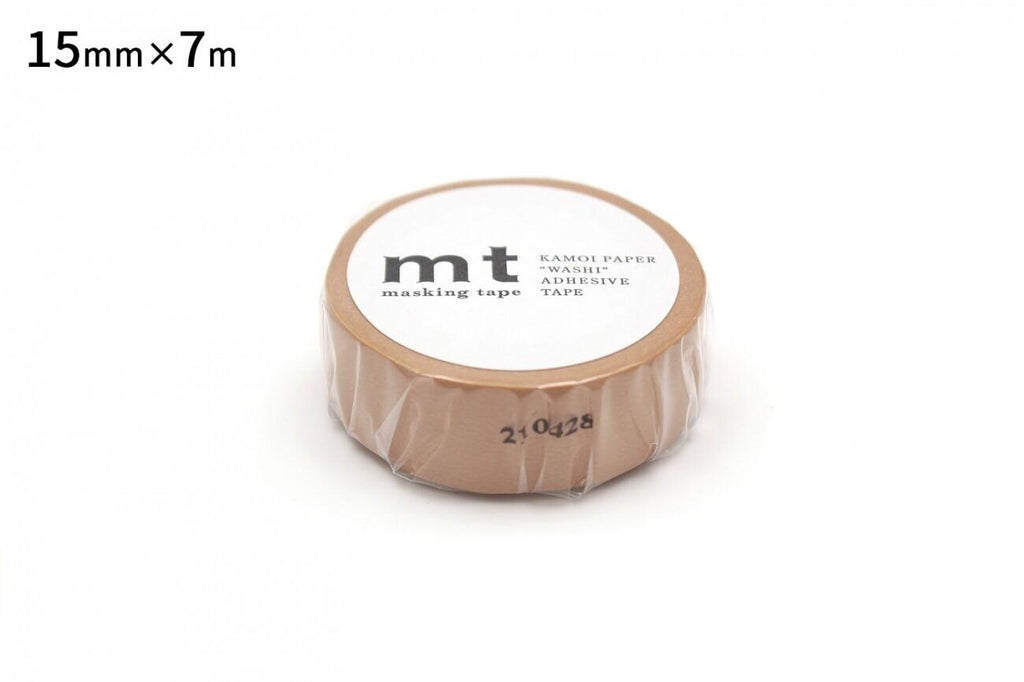 A roll of masking tape with the text "kt" printed on it.