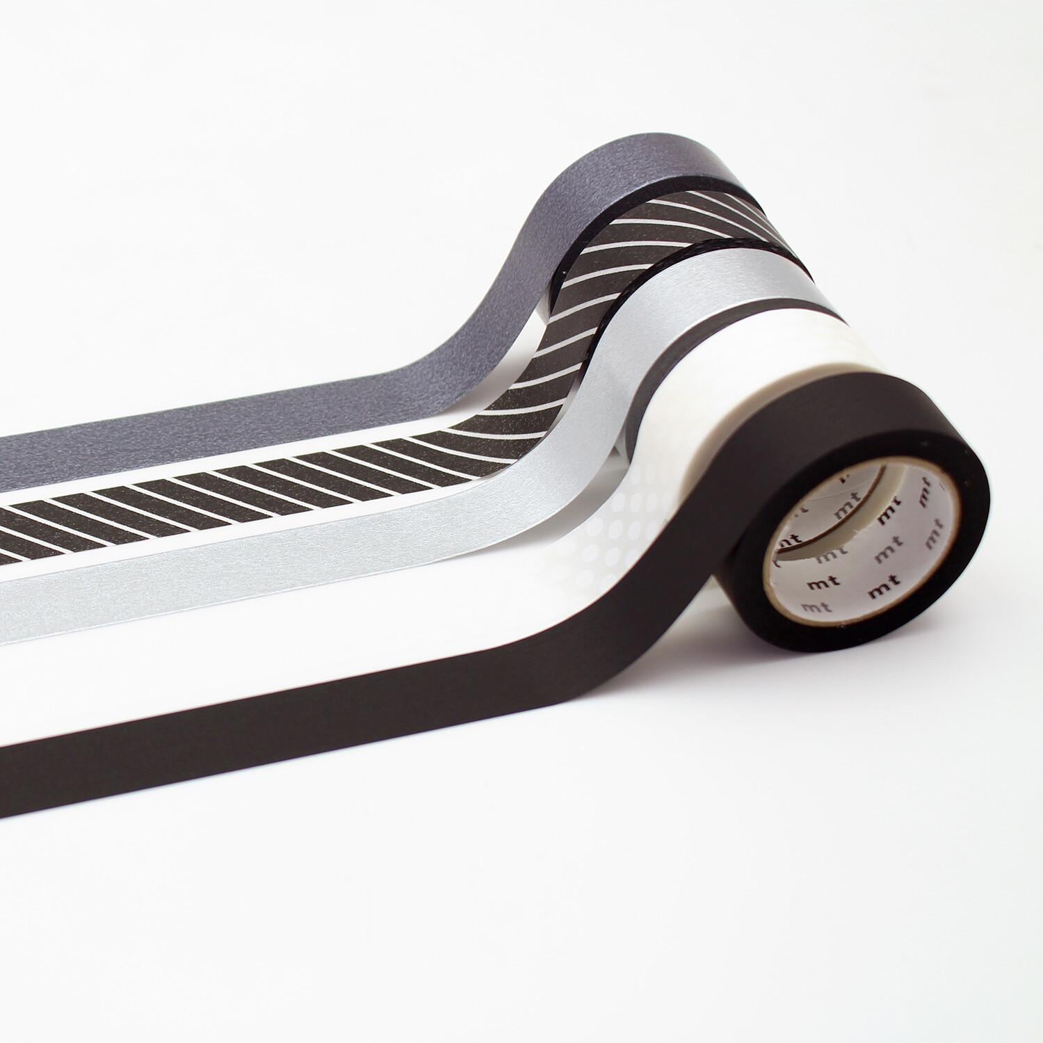 A roll of black, white, and gray metallic tape is shown against a white background.