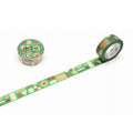 a roll of green and brown patterned tape with a geometric design, lying on a white surface.