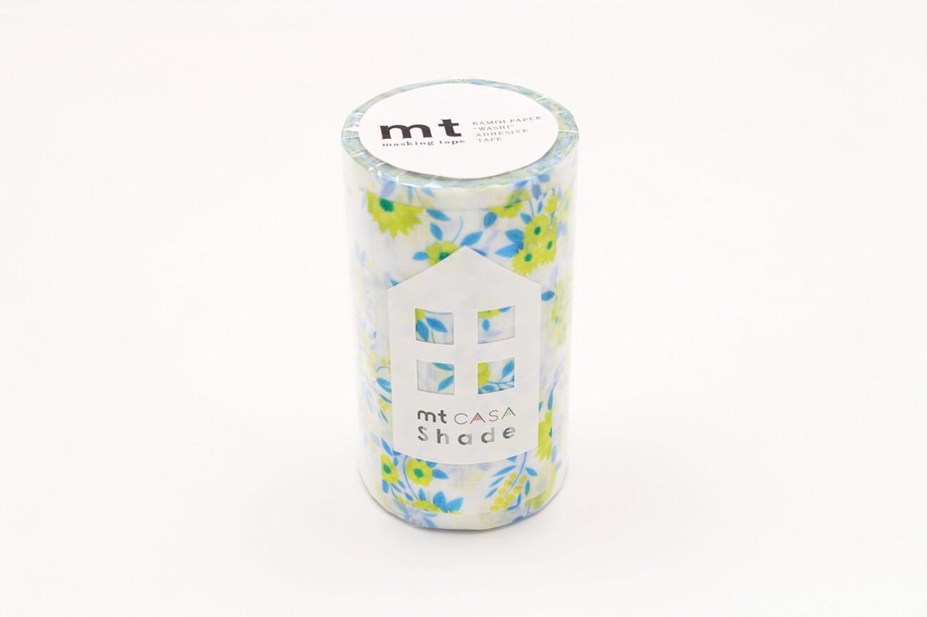 A cylindrical container with a floral pattern and a label that reads "mt CASA Shade".