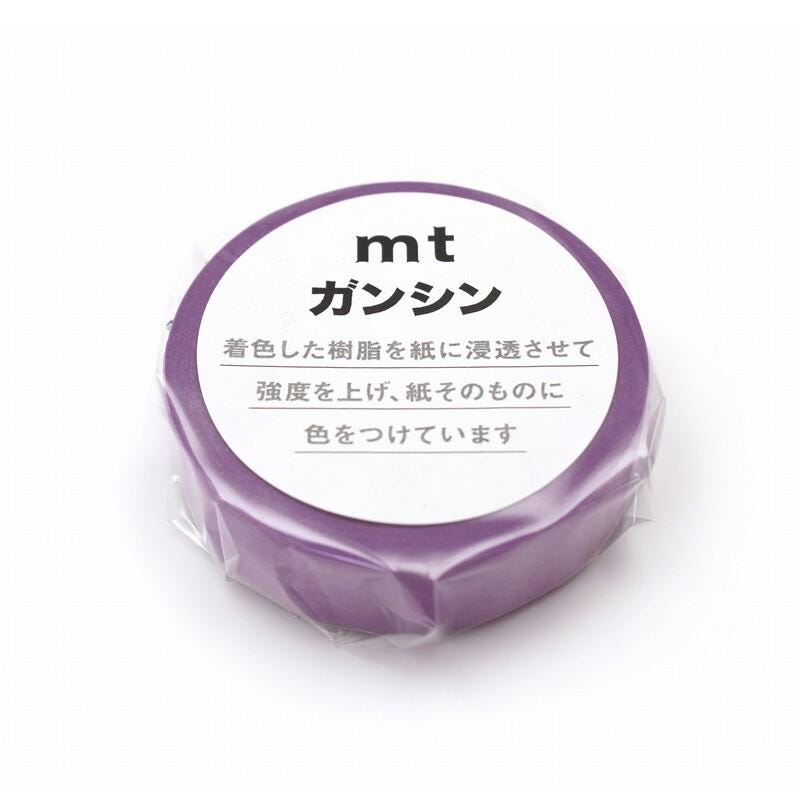 a purple object with Japanese text on it, which appears to be a product label or packaging.