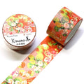 a roll of washi tape with a floral pattern and a round container with a label that reads "KIMONO WASHI TAPE HANA".