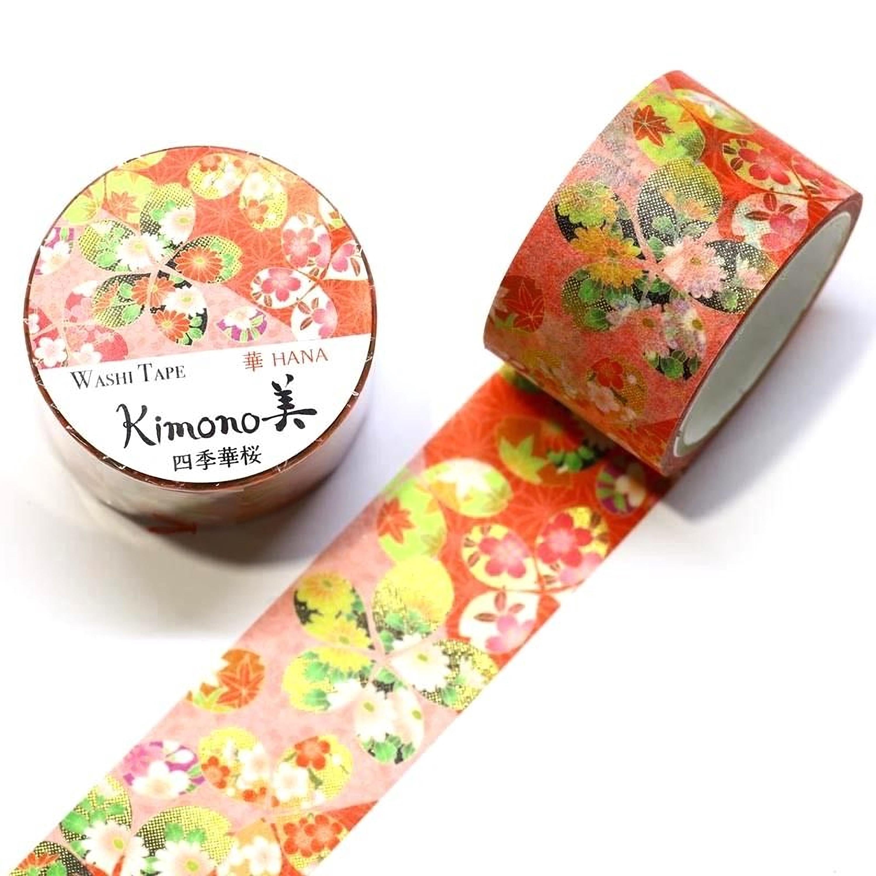 a roll of washi tape with a floral pattern and a round container with a label that reads "KIMONO WASHI TAPE HANA".