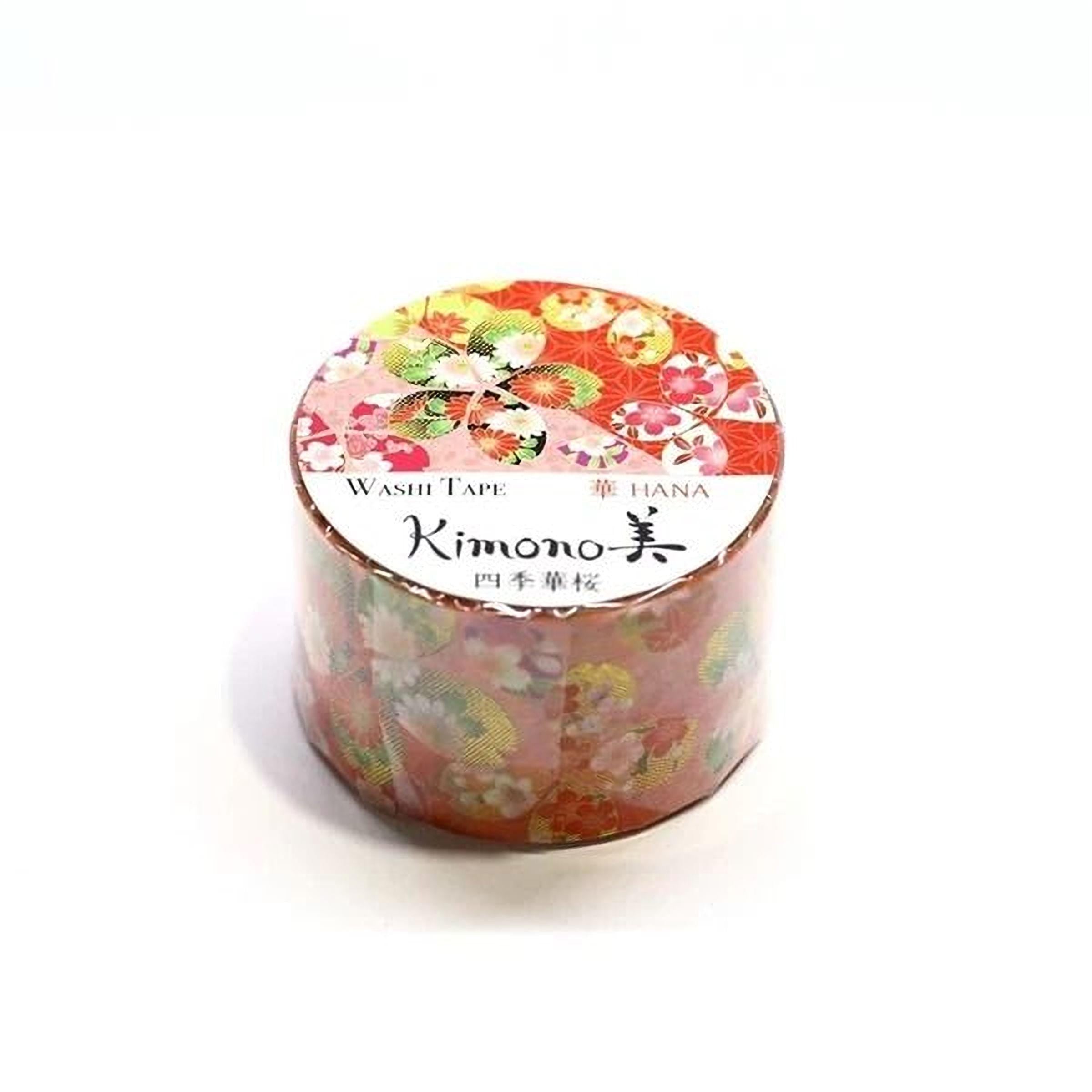 A cylindrical container with a floral pattern and text on it, which appears to be a product of the brand Kimono.