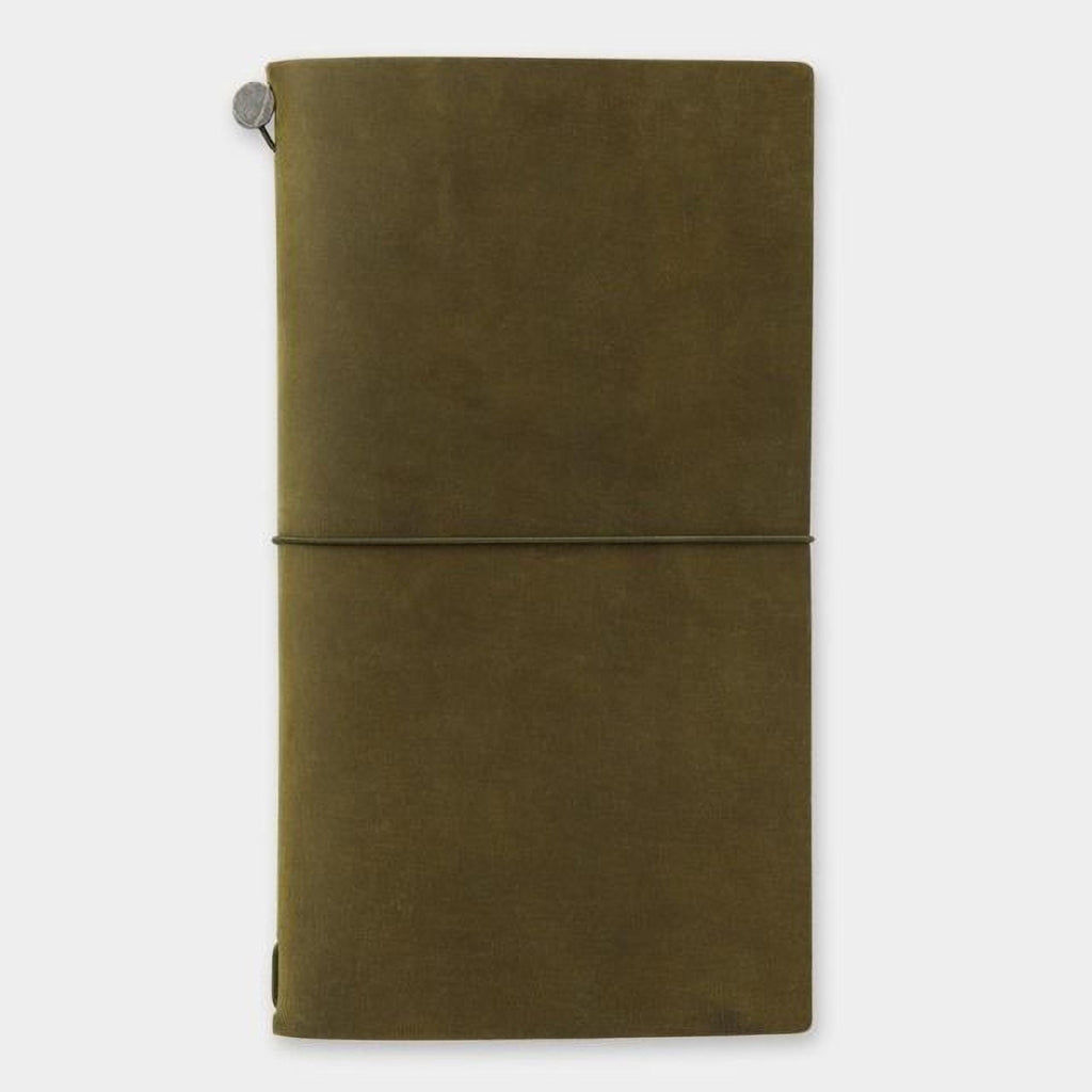 a large, green, leather-like notebook or journal with a metal clasp on the top left corner.
