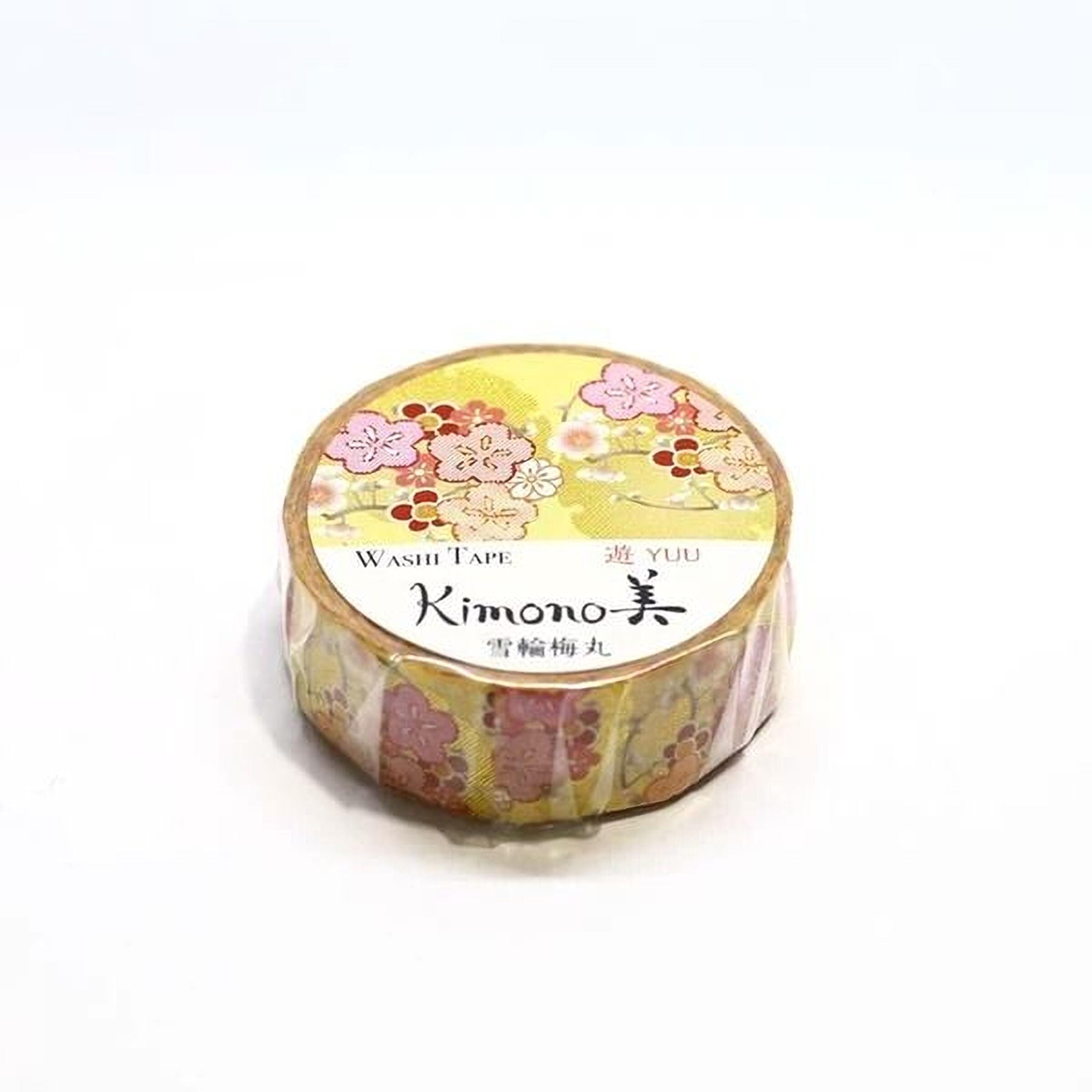 A round roll of washable tape with a floral design on it.