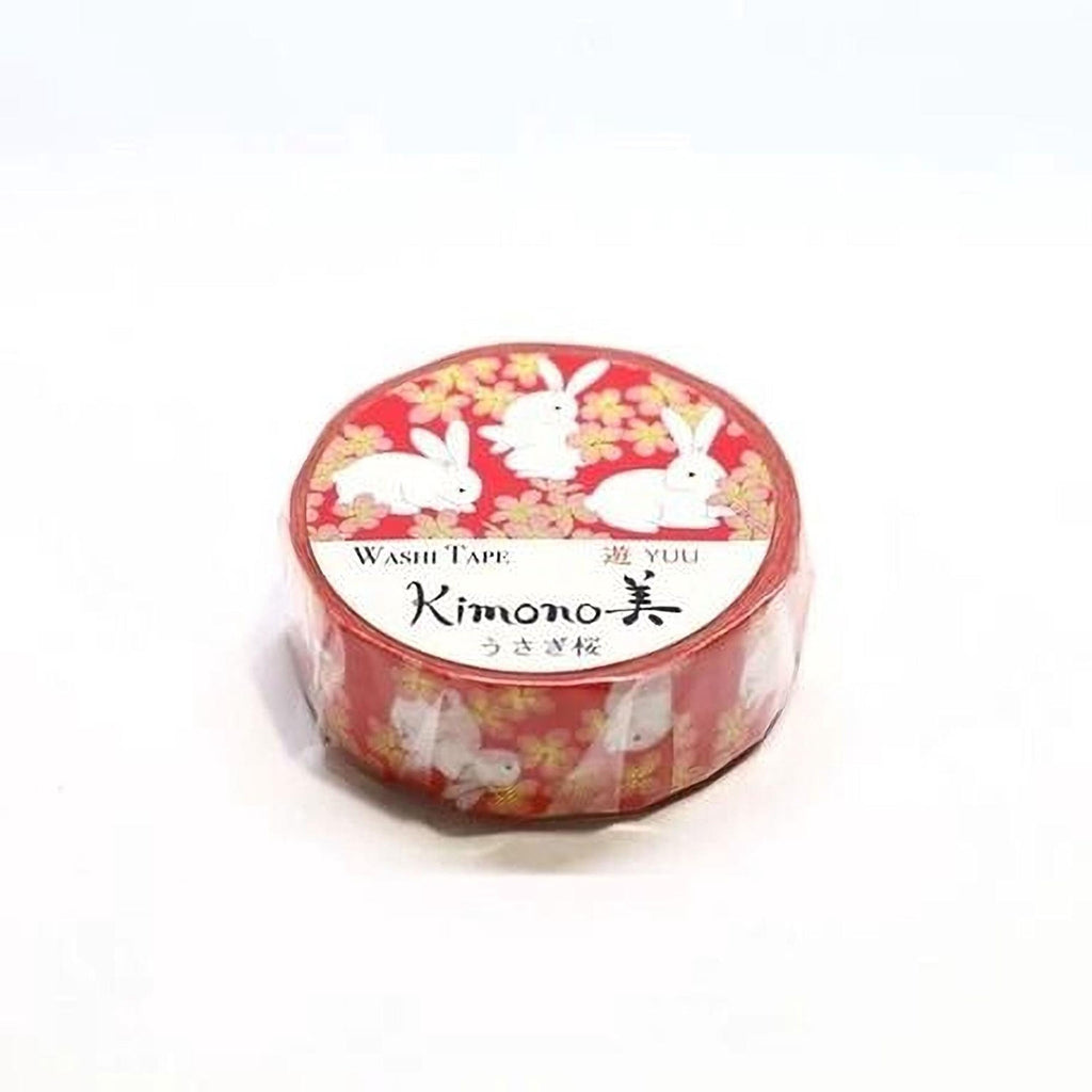 A red and white roll of washable paper tape with a pattern of white rabbits on a red background.