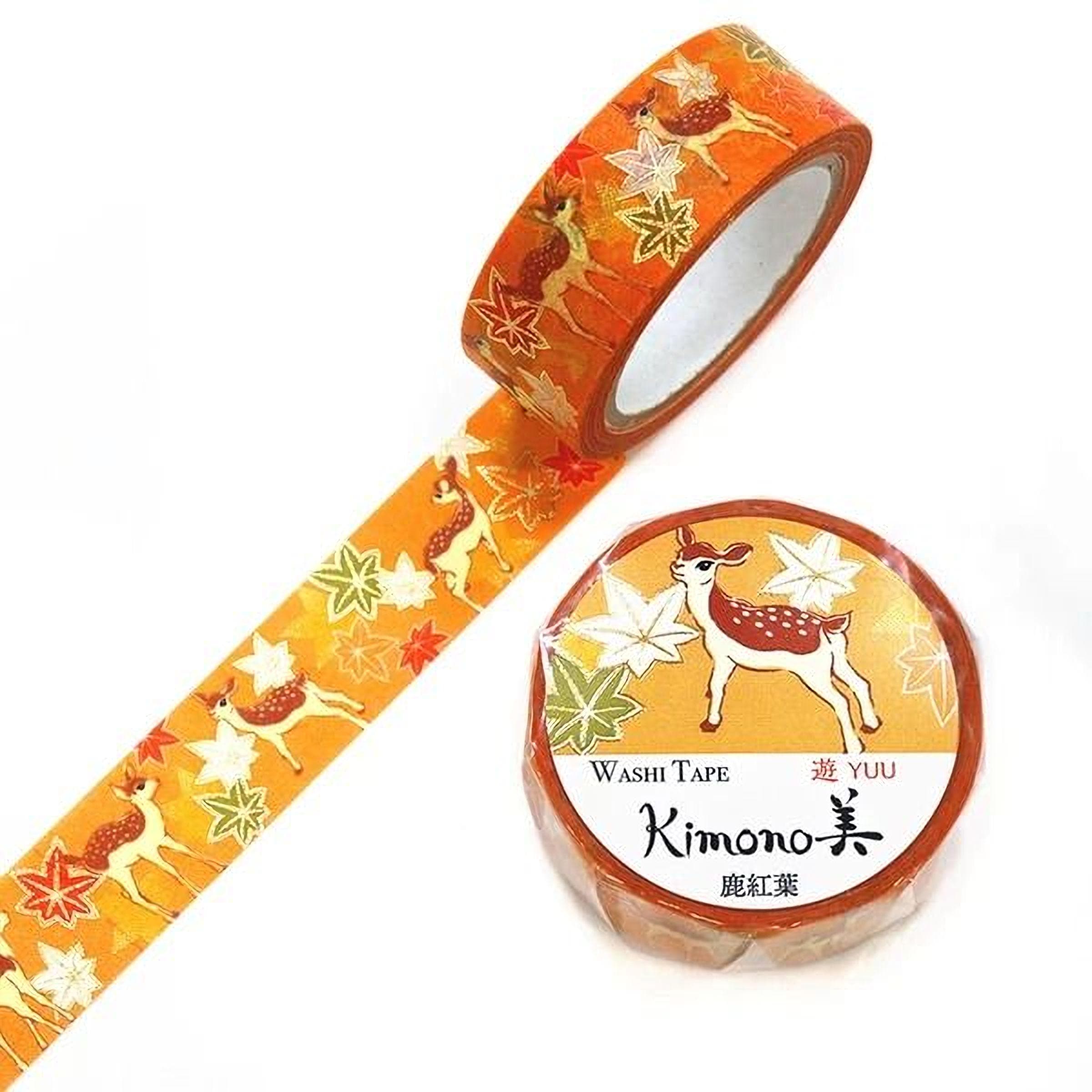 a roll of washable tape with a pattern of deer and leaves, and a round label with the text "YUU Kimono" and an illustration of a deer.