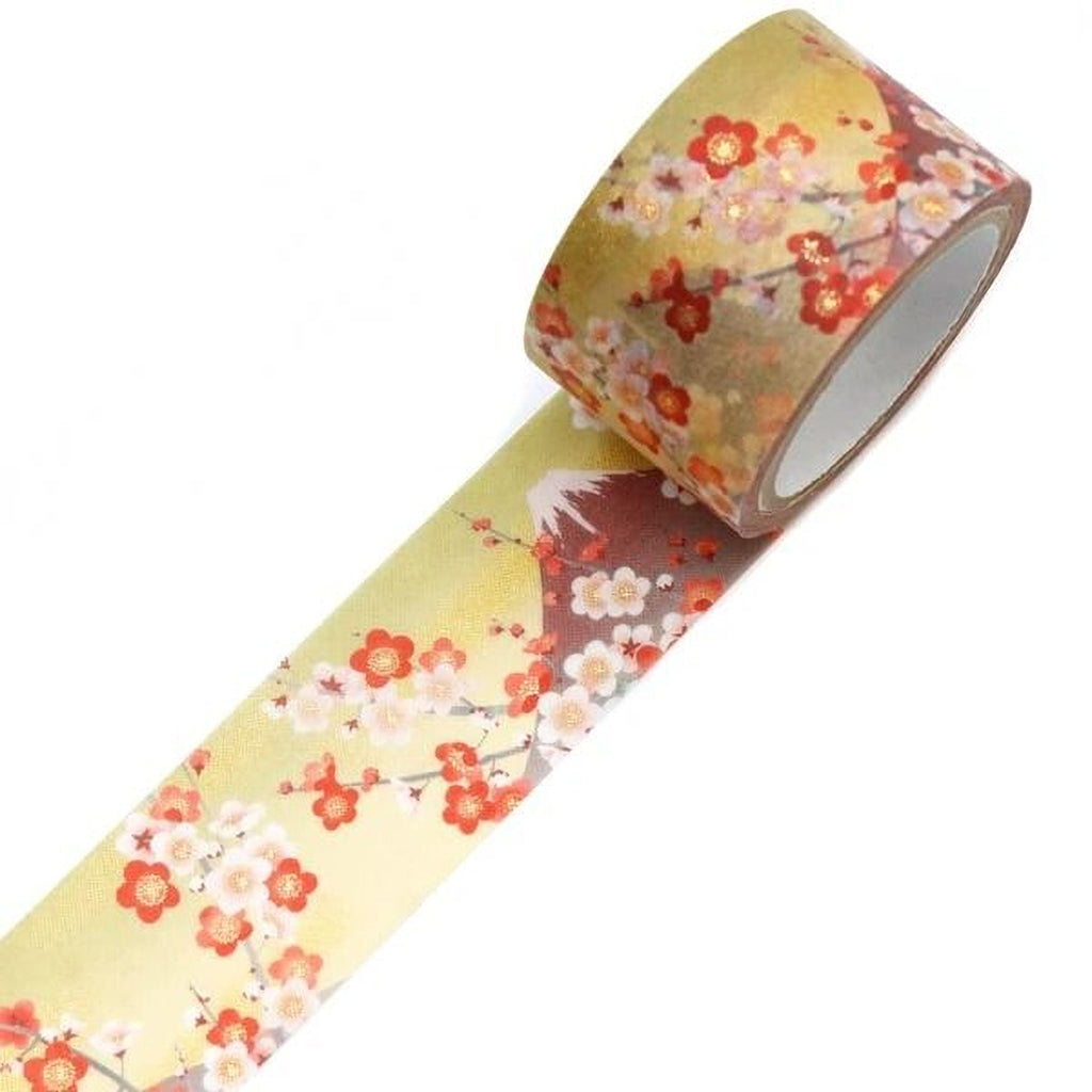 A roll of tape with a floral pattern on it, featuring red and white flowers on a yellow background.