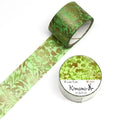 two rolls of washable green and gold metallic tape with a leaf pattern, one roll is placed on top of the other.