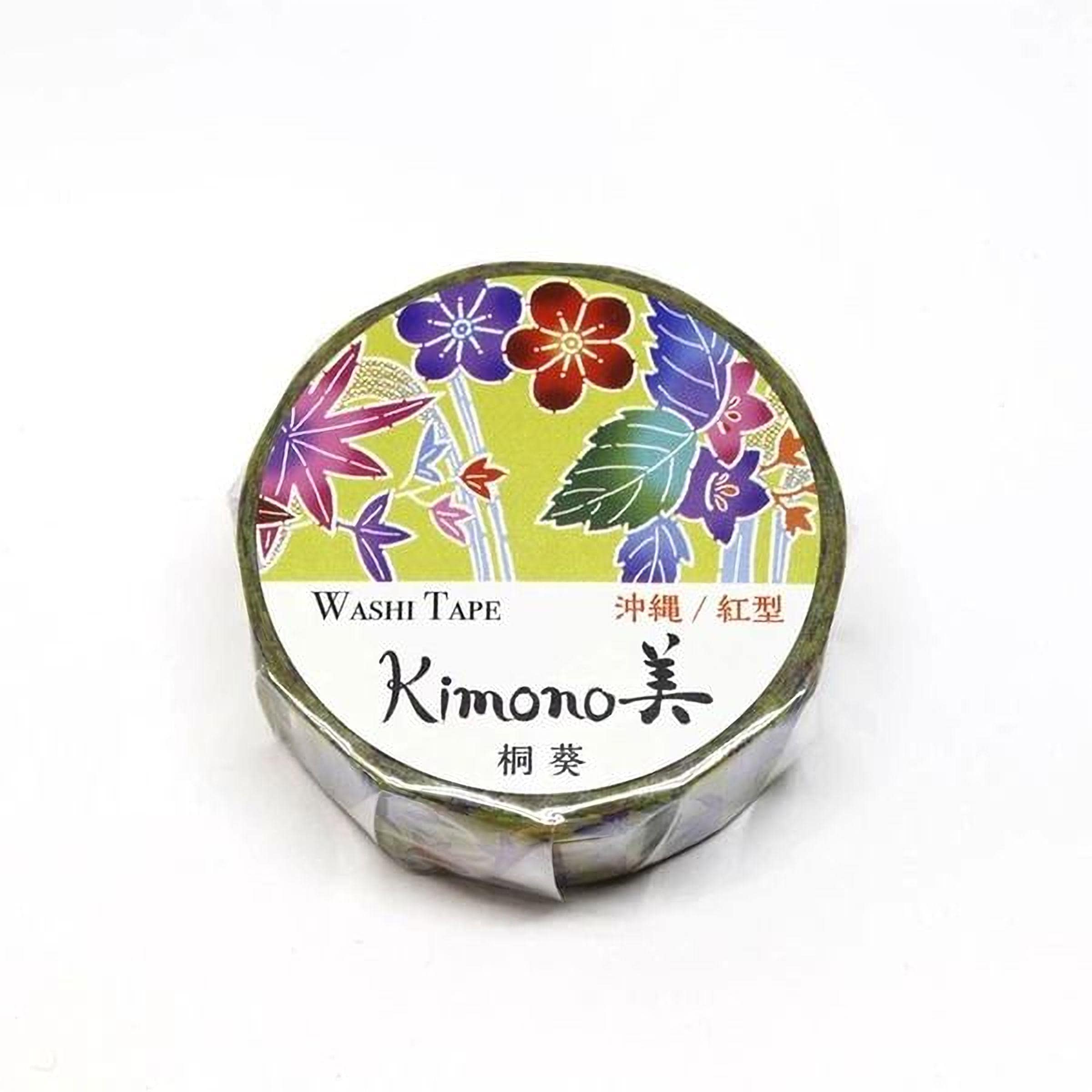A round, colorful roll of washi tape with a floral design.
