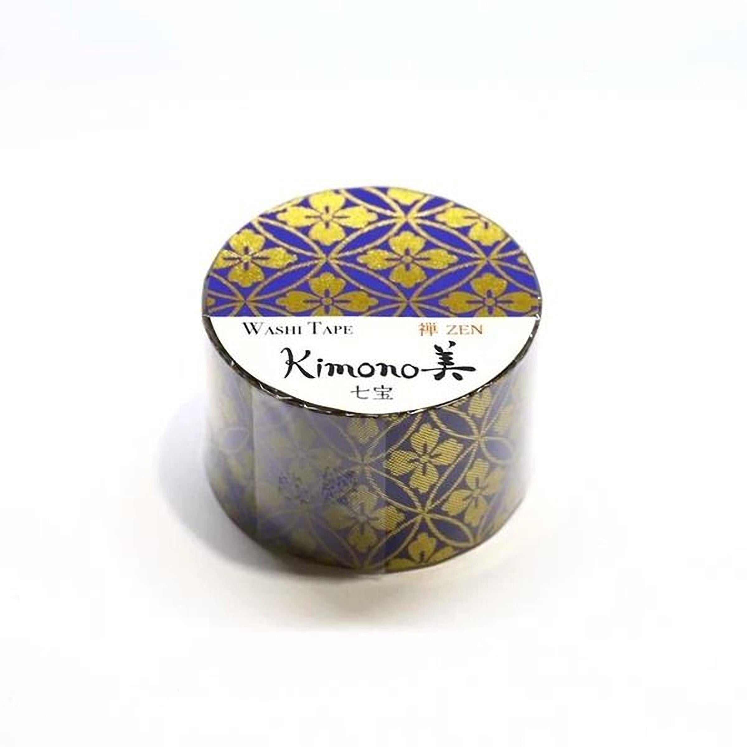A cylindrical container with a patterned design in shades of blue and gold, featuring Japanese characters and the text "Washi Tape" and "Zen".
