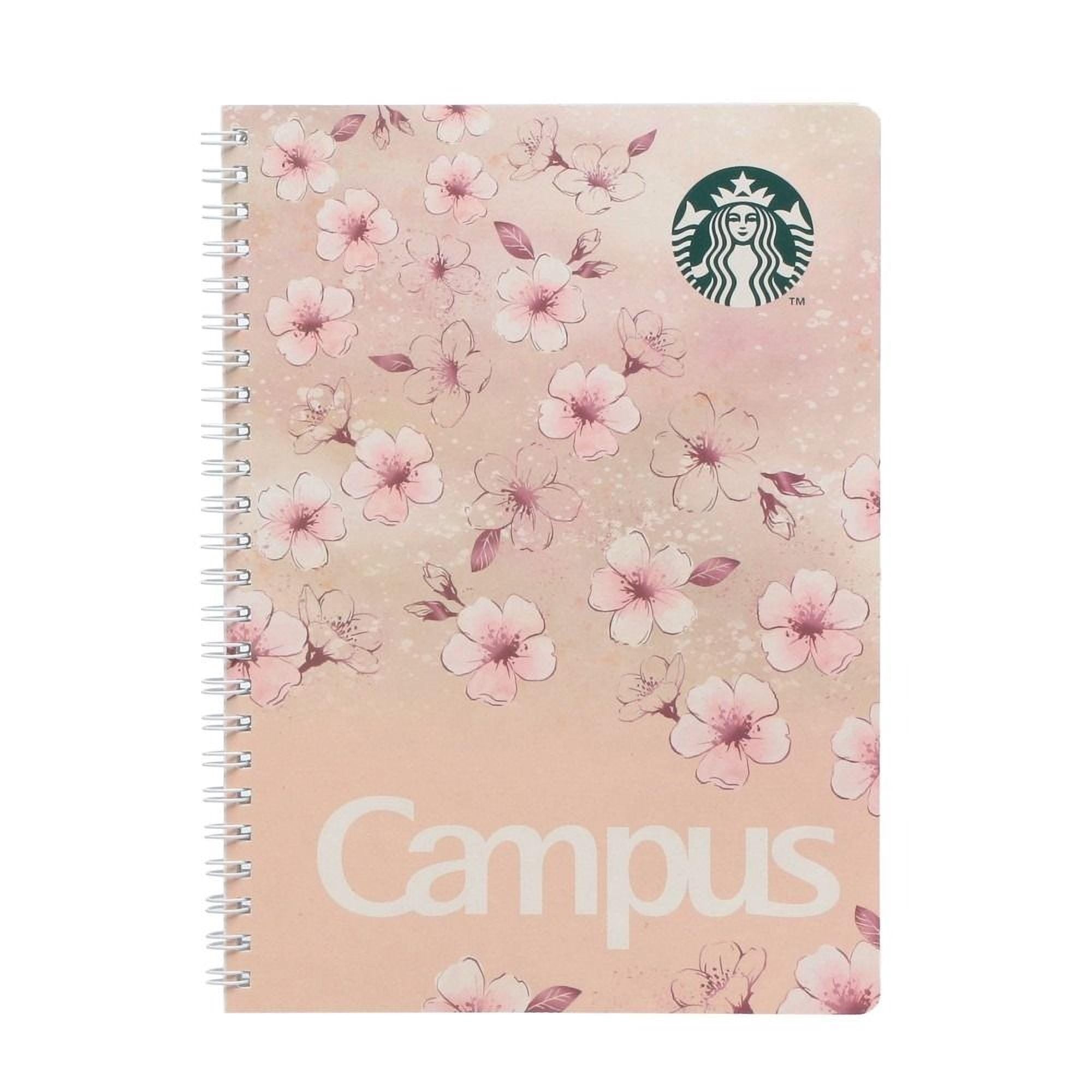 A spiral-bound notebook with a pink floral pattern and the word "Campus" printed on the cover.