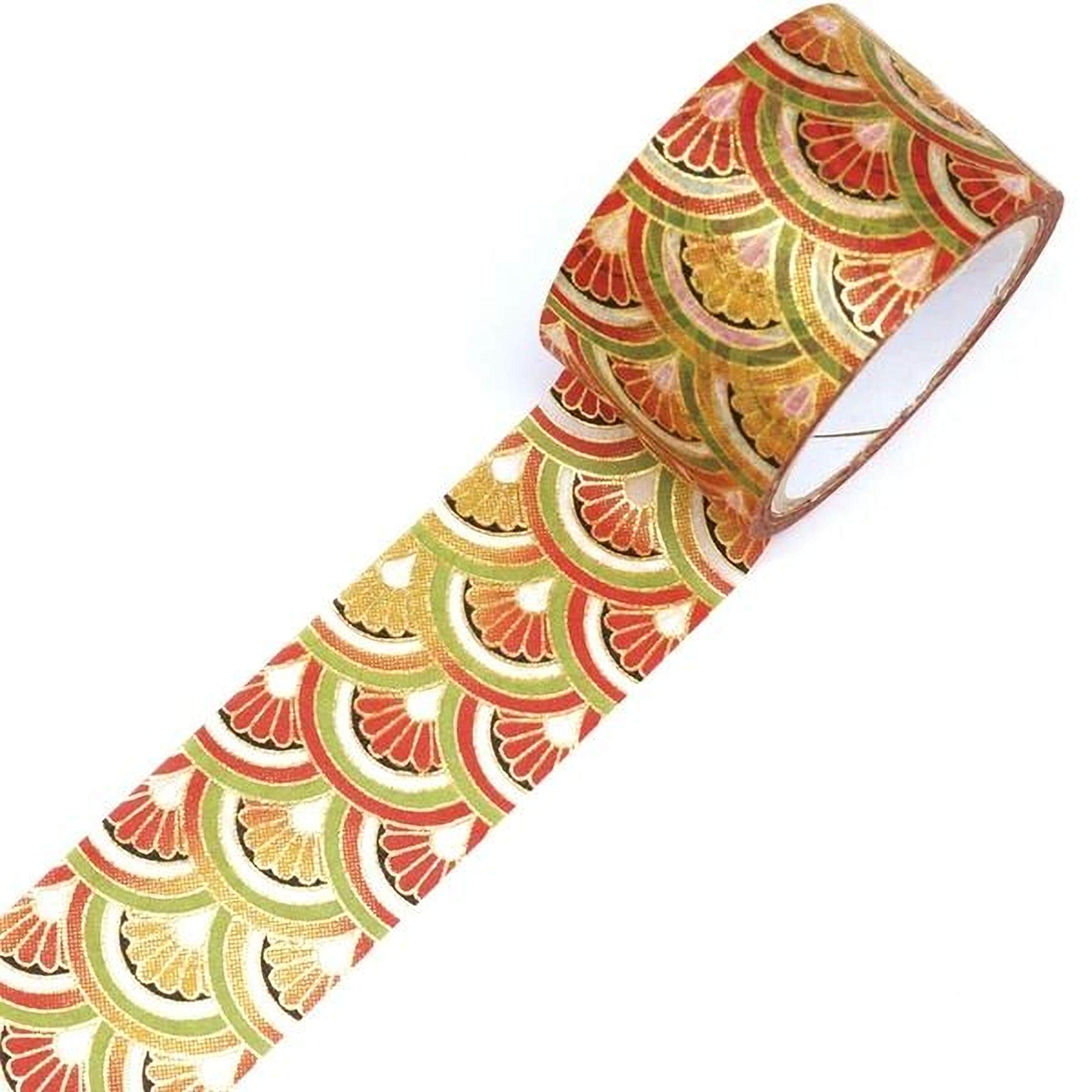A roll of patterned tape with a repeating design of red, green, and yellow flowers or leaves.