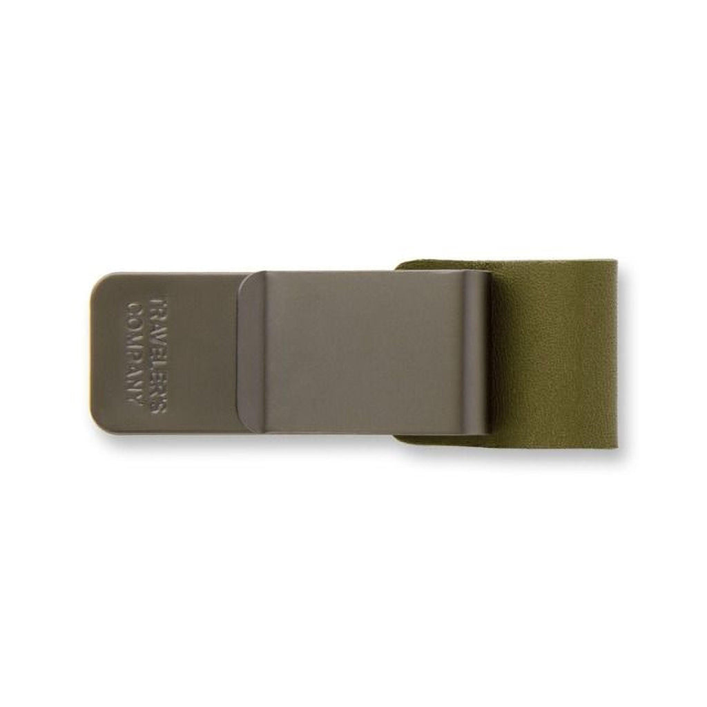 A grey metal money clip with a green leather cover.