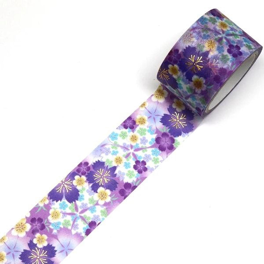 A roll of patterned tape with a floral design in shades of purple, blue, and yellow.
