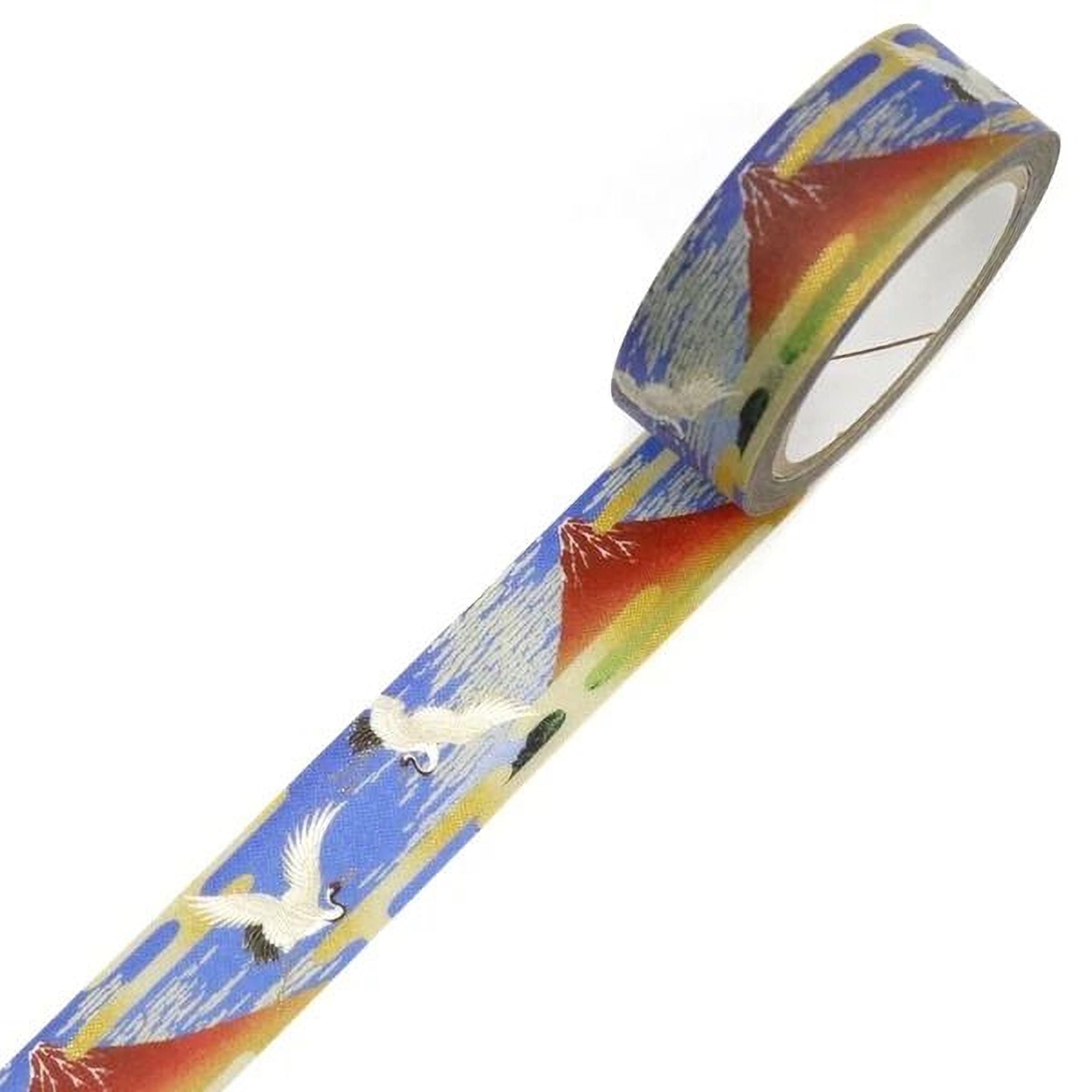 A roll of tape with a repeating pattern of mountains and birds on it.
