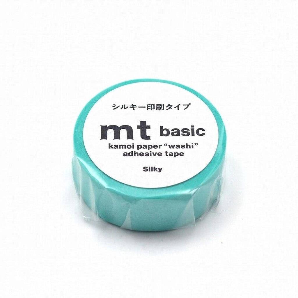 A turquoise roll of kamoi paper "washi" adhesive tape.