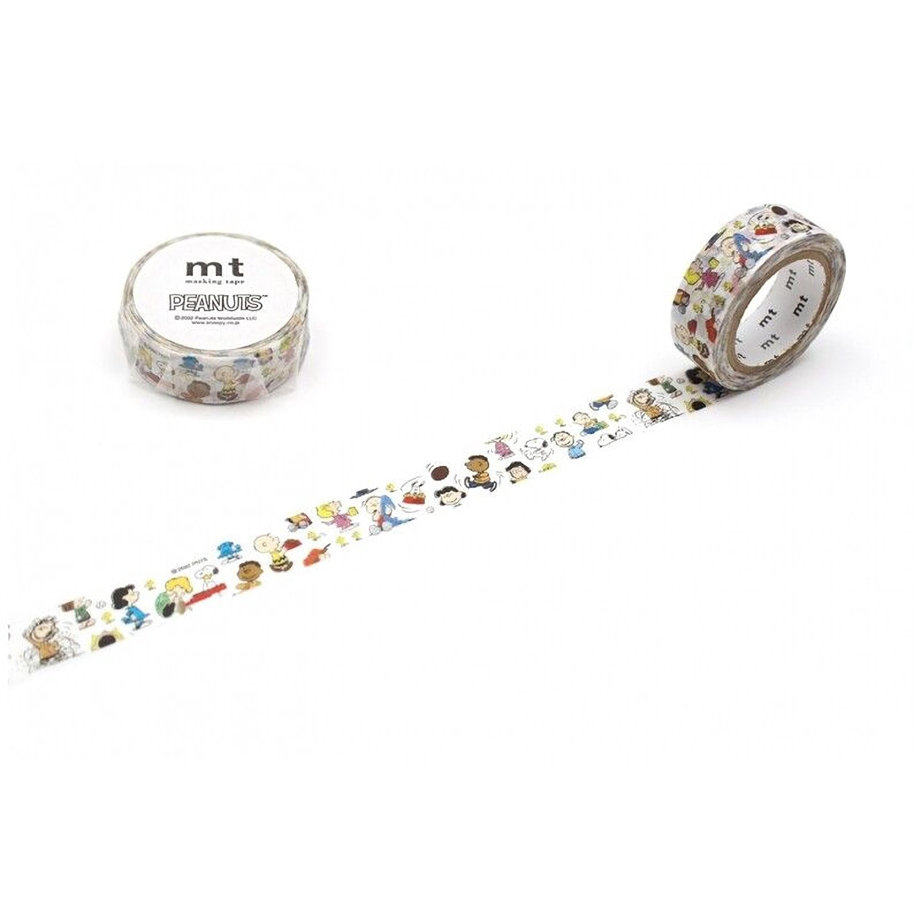 a roll of colorful children's character-themed tape and a round container of the same tape.