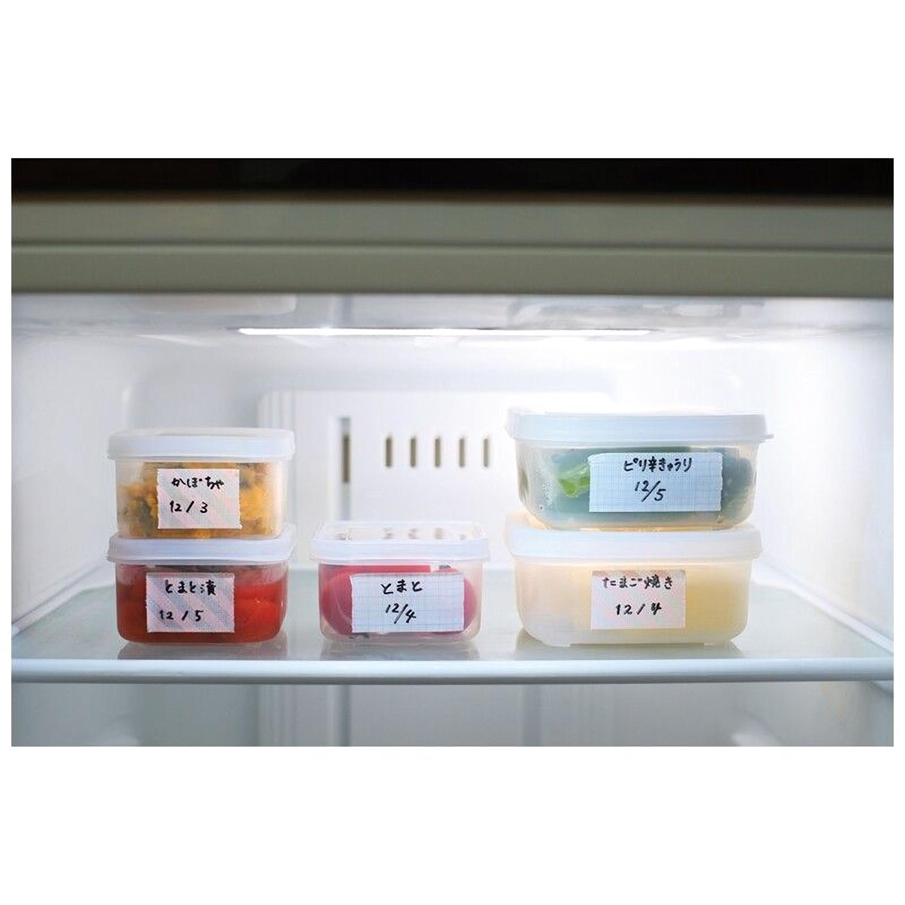 A refrigerator shelf containing various food items, including containers with labels indicating the contents and their percentages.