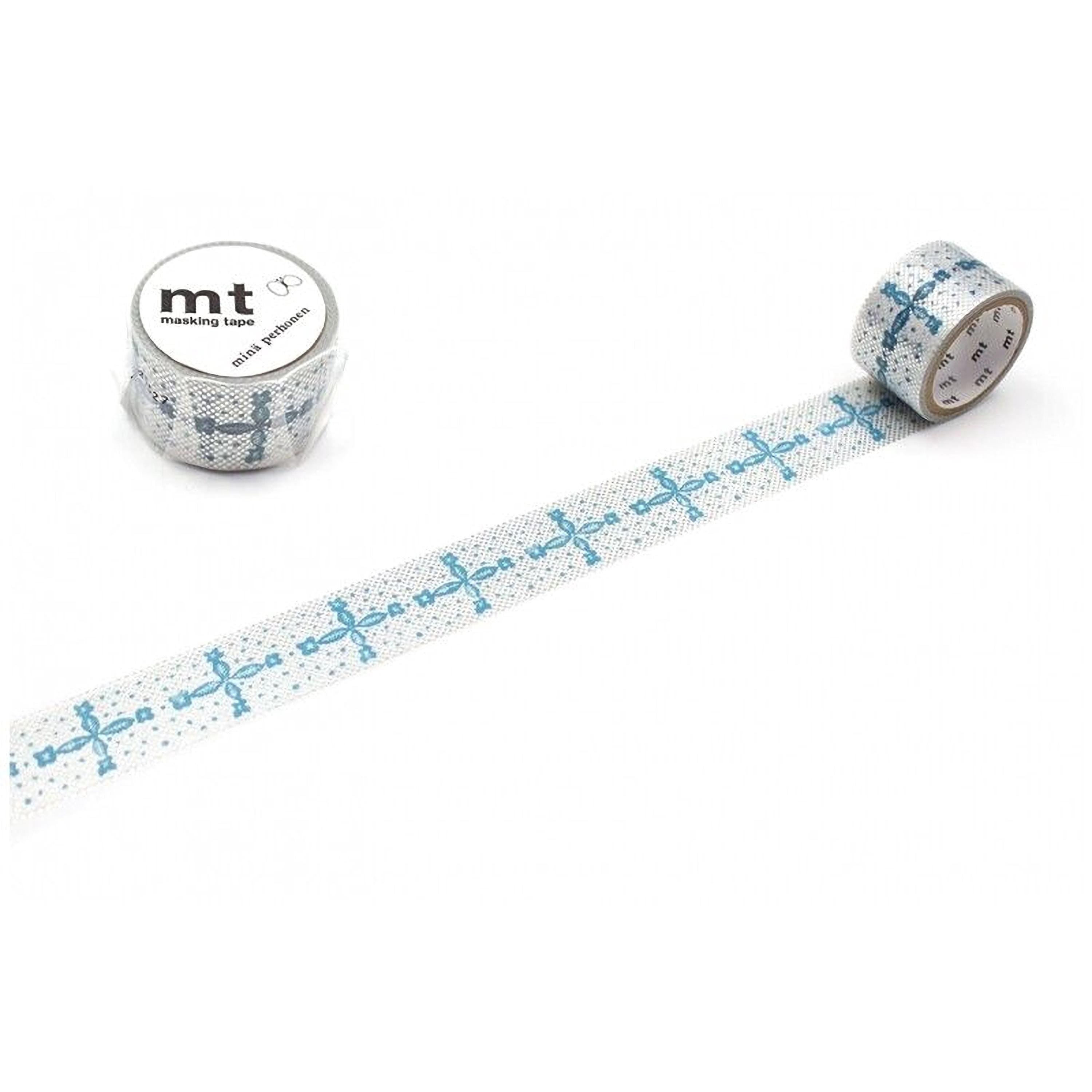 a roll of blue and white patterned tape with a repeating design, lying on a white surface.