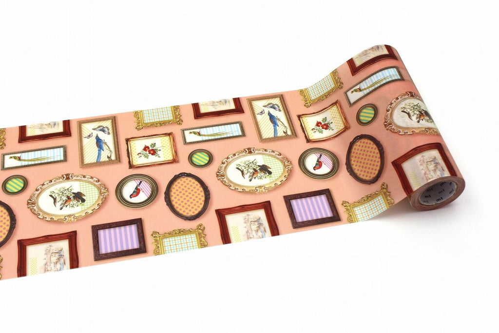 a roll of paper with a repeating pattern of various framed items, including pictures, clocks, and other decorative elements, all set against a peach-colored background.