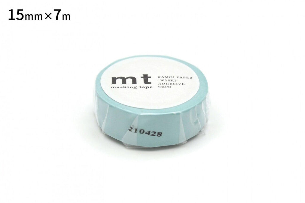 A roll of blue masking tape with the text "mt" printed on it.
