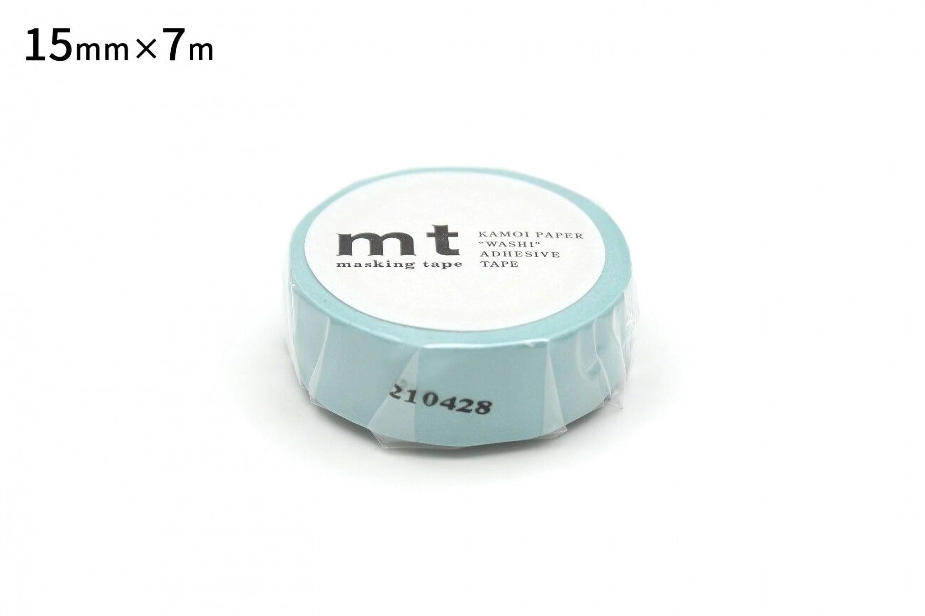 A roll of blue masking tape with the text "mt" printed on it.
