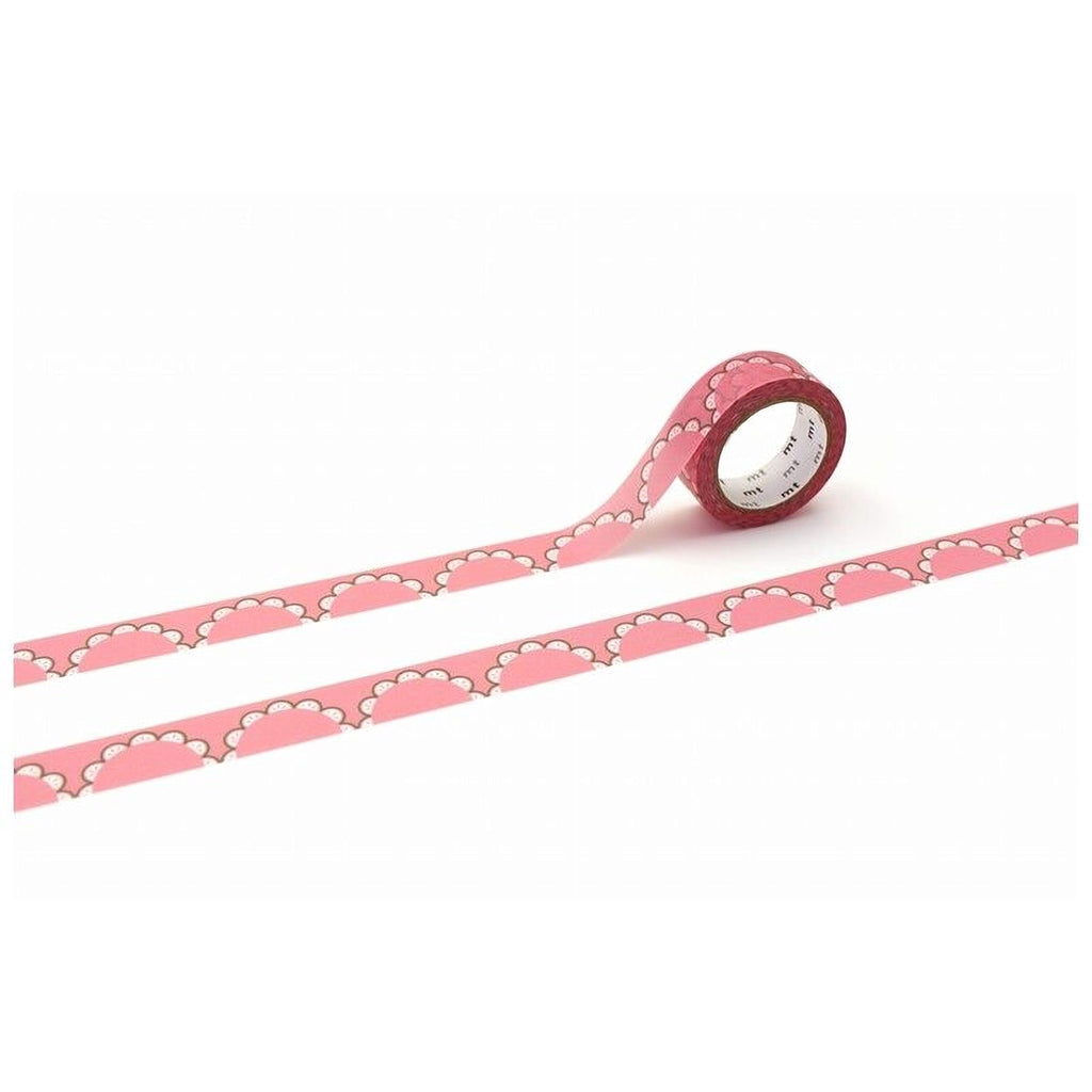 A roll of pink scalloped tape is lying on its side on a white background.