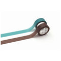 two rolls of brown and teal tape lying on a white background.