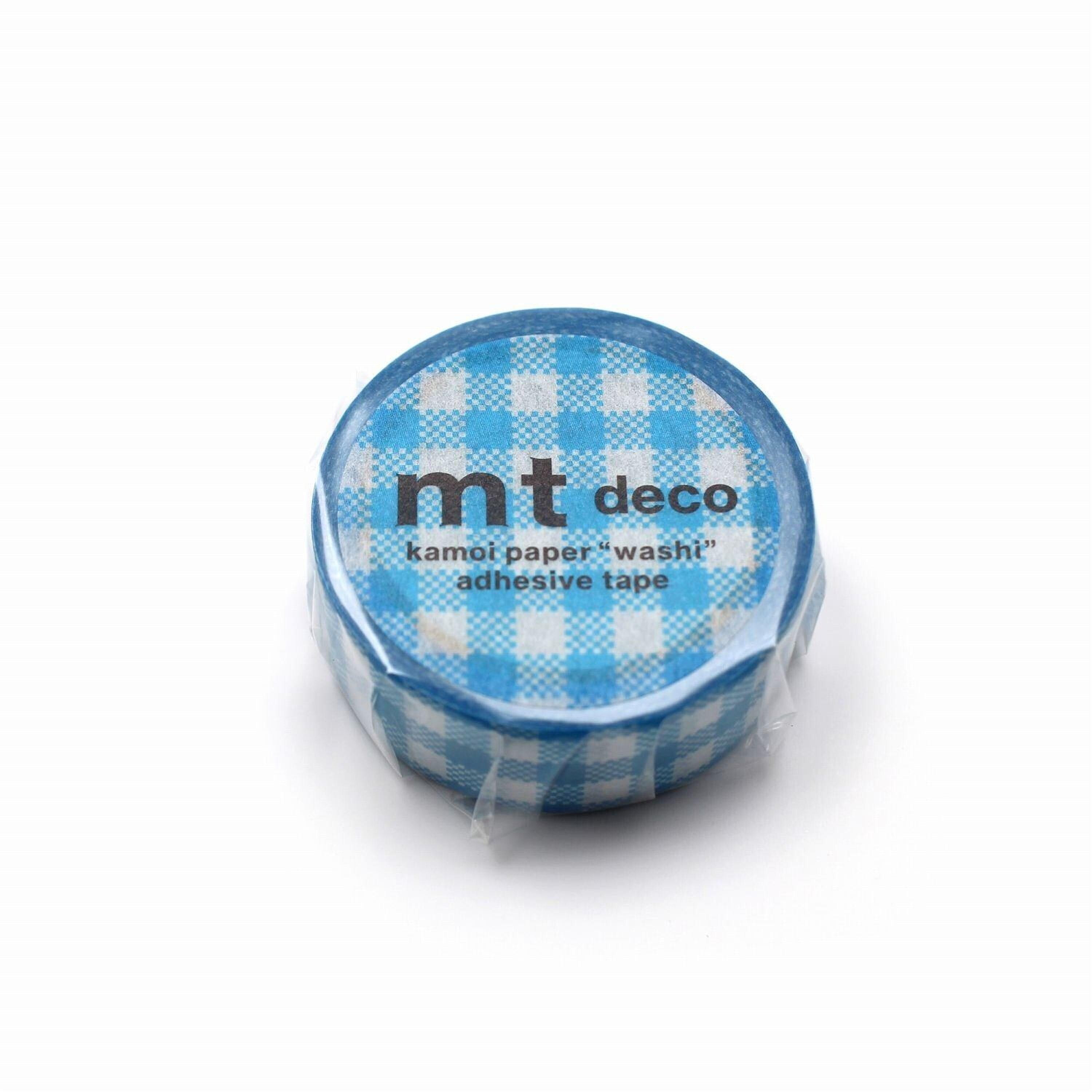 A blue and white checkered tape roll with the text "mt deco kamot paper 'washi' adhesive tape" printed on it.
