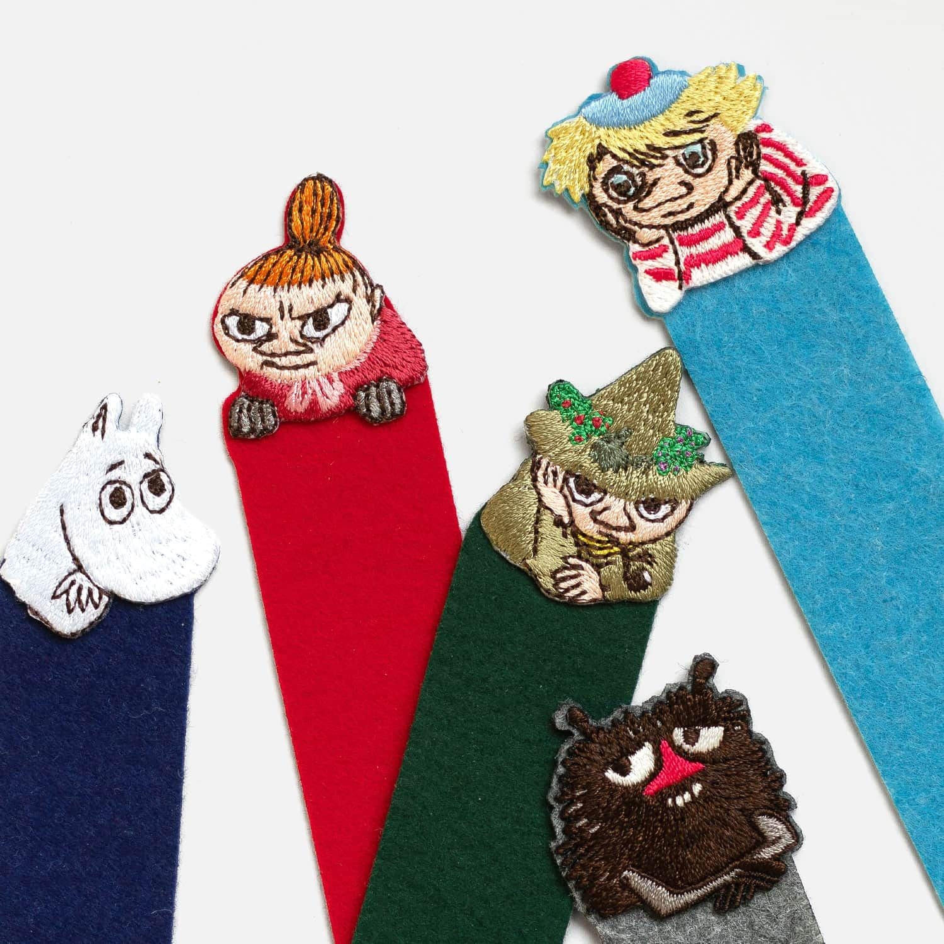 a collection of colorful felt bookmarks, each adorned with a different cartoon character.