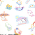 a collage of various cartoon character stickers, including Moomins, on a white background.