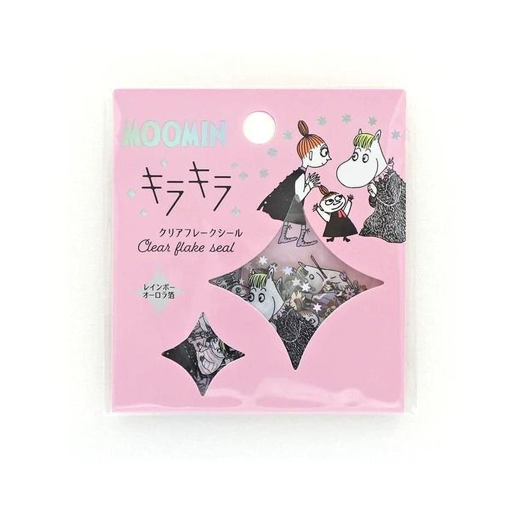 The image is a pink packaging box with a cartoon illustration of a group of characters, including Moomin characters, and a clear plastic window.