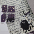 various stickers and illustrations, including a cow, a cat, and stars, all set against a background of text.