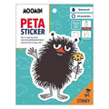 a sticker of a black, furry creature holding a yellow flower.