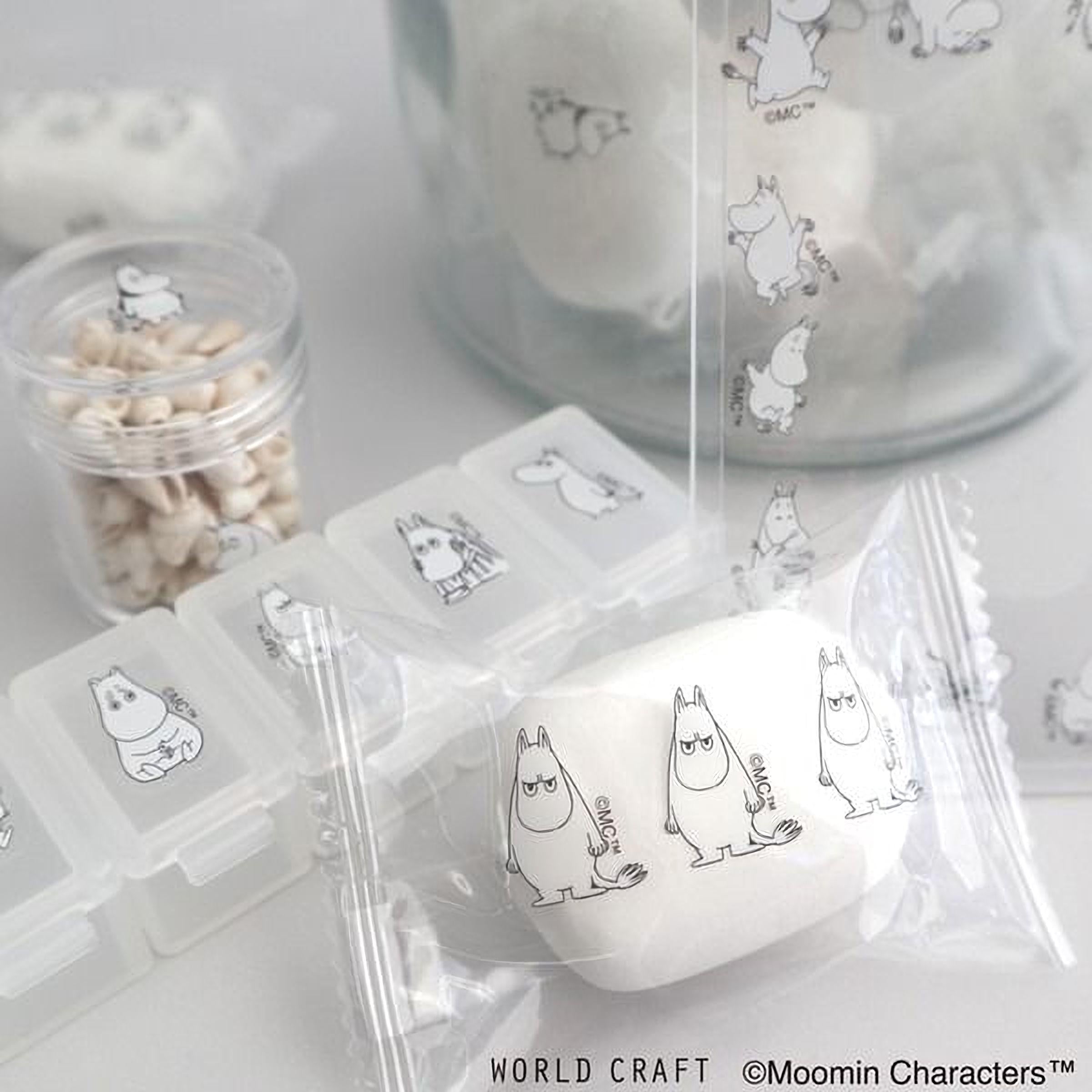 a collection of Moomin character-themed items, including a clear container with Moomin characters, a clear container with Moomin characters, and a clear container with Moomin character-themed items.