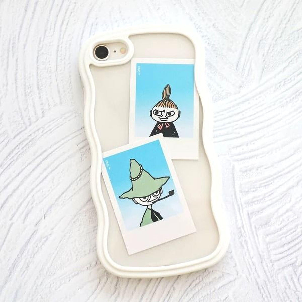 two small illustrations of cartoon characters, one with a green hat and the other with a black hat, placed on a white surface.